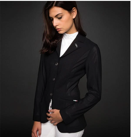 woman with dark hair wearing our aa mesh motion lite show coat in black
